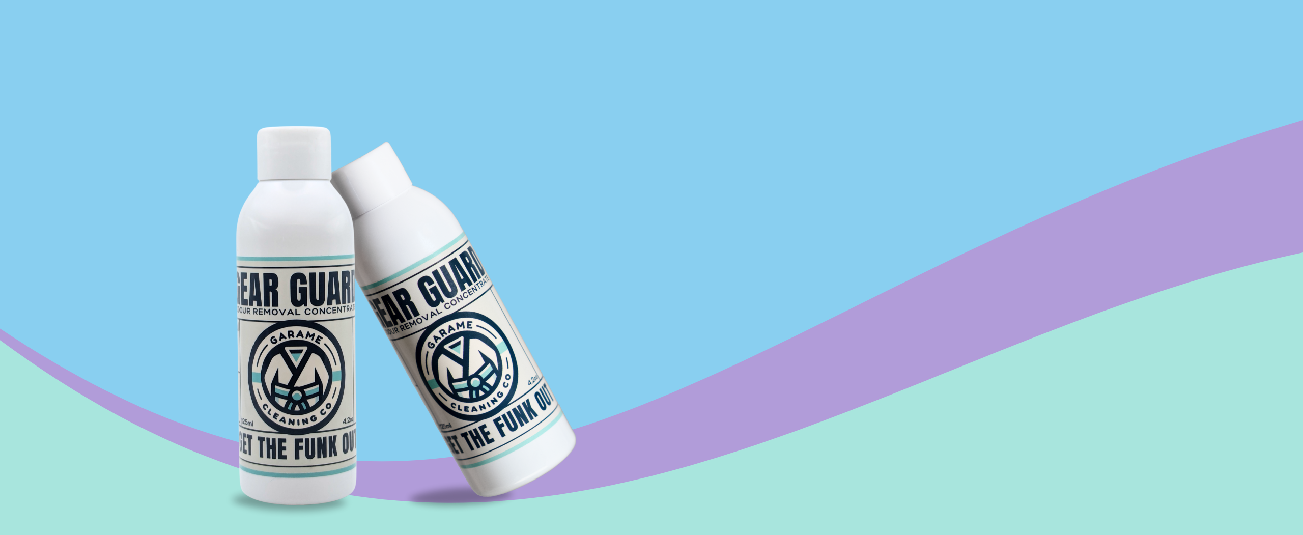 Two bottles of Gear Guard odour-removing laundry additive by Garame Cleaning Co on a teal and purple background"